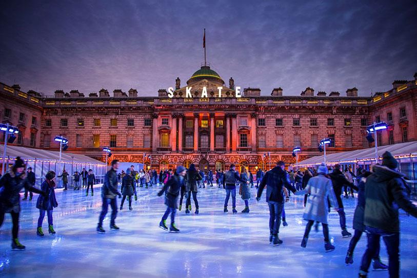 People ice skating outside of Somerset House